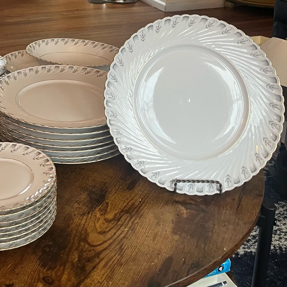 Elegant White fine China Set. Service for 4